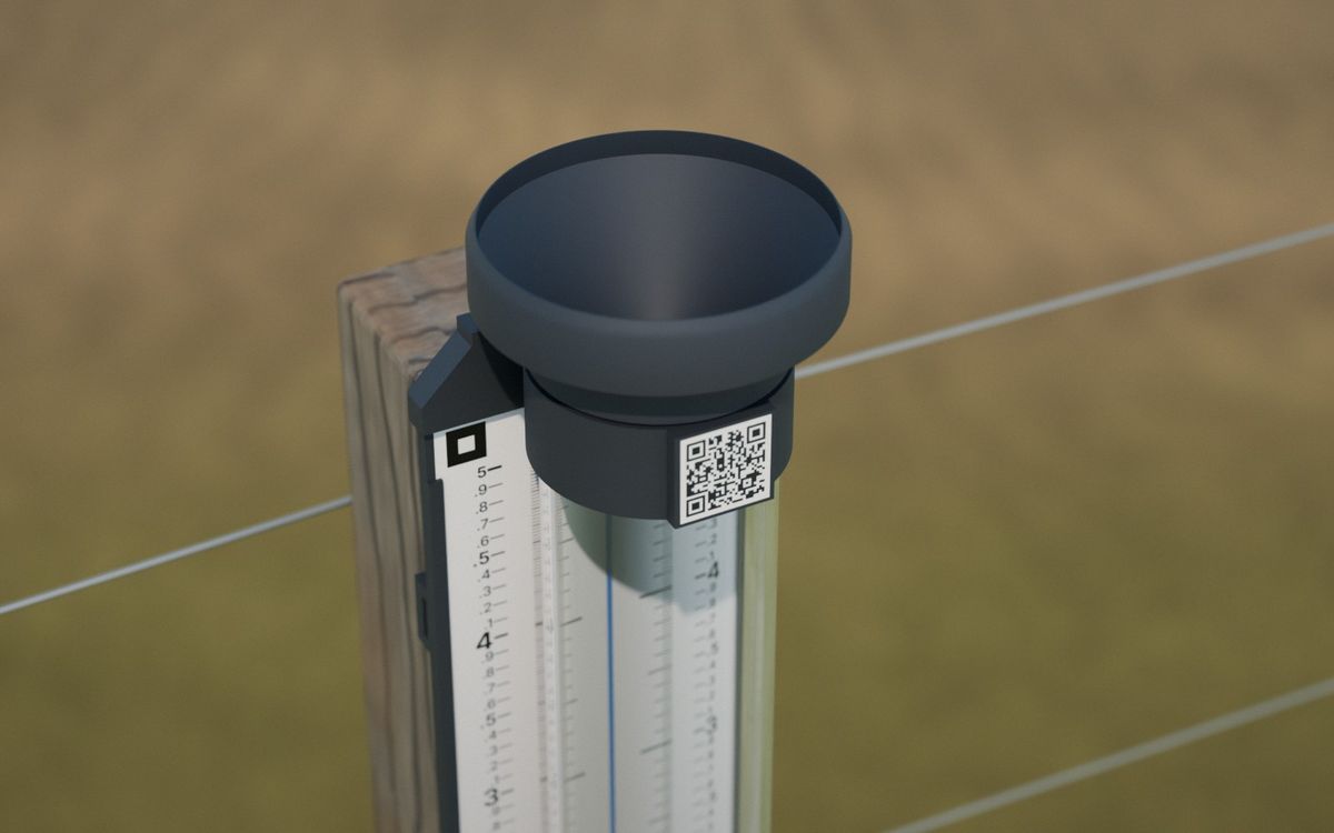 3D render of the top of the prototype gauge: a charcoal funnel and, on the collar under it, a square QR code.