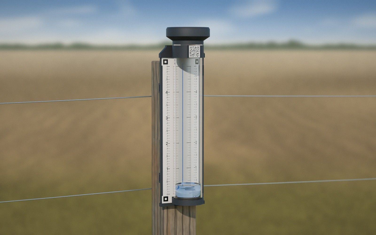 3D render of the prototype rain gauge on a wooden fence post at the edge of a field: a charcoal funnel on top, a clear tube in front of a white scale, and a code on the collar.